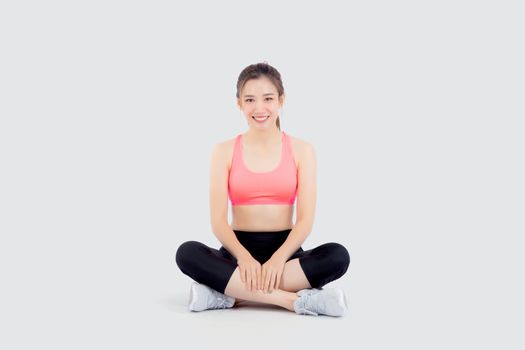 Beautiful portrait young asian woman sitting yoga, asia girl health care with workout fitness relaxing with active exercise isolated on white background, healthy and wellbeing concept.