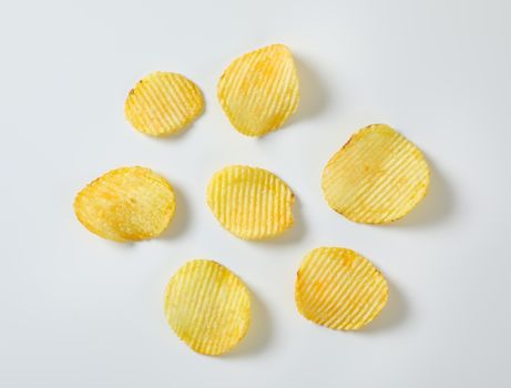 Six thin ridged potato chips