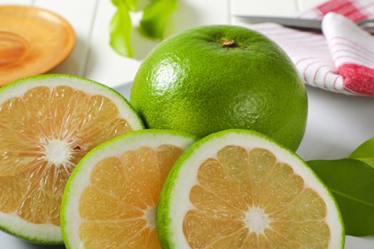 Sweetie fruit (green grapefruit, pomelit) - whole fruit and slices