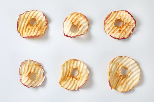 Six apple chips (dried thin apple slices)