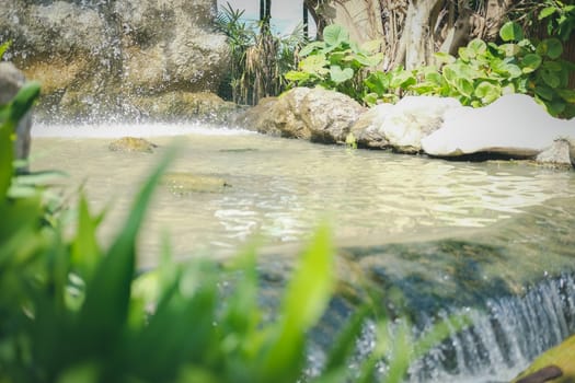 cascade watefall & pond plant tree in garden park