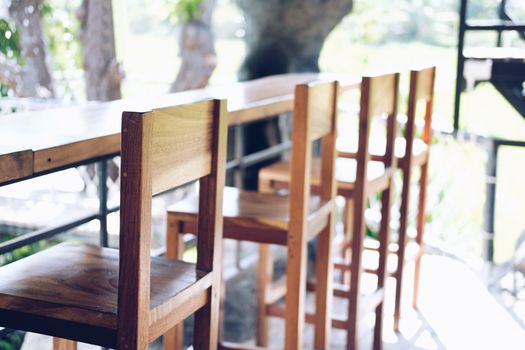 wooden chair on terrace in cafe coffee shop restaurant
