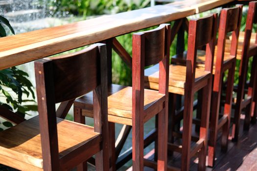 wooden chair on terrace in cafe coffee shop restaurant