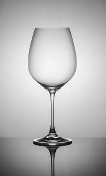 .empty drink glasses on dark background with back light.