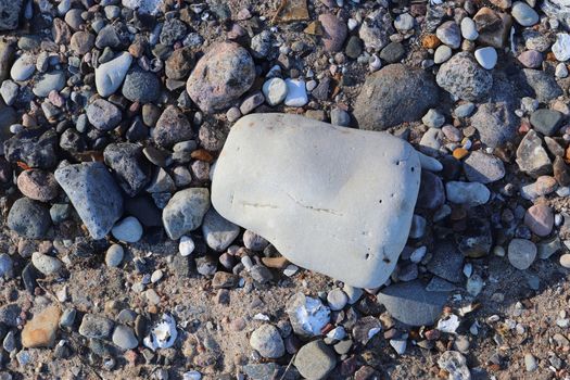 Beautiful stone pebbles at the beach of the baltic sea in the north of Germany