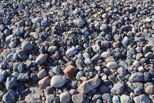 Beautiful stone pebbles at the beach of the baltic sea in the north of Germany