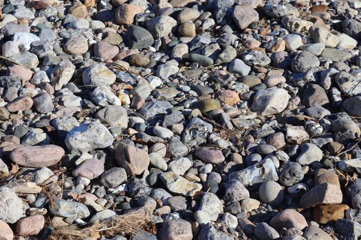 Beautiful stone pebbles at the beach of the baltic sea in the north of Germany