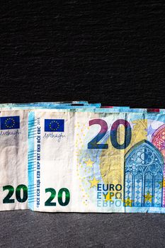 Selective focus on detail of euro banknotes. Close up macro detail of money banknotes, 20 euro isolated. World money concept, inflation and economy concept