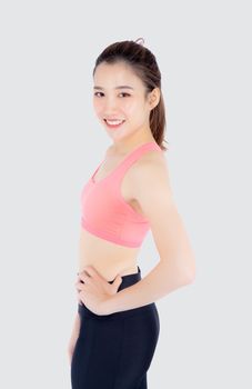 Beautiful portrait young asian woman in sport clothes with satisfied and confident isolated on white background, asia girl cheerful have shape and wellness, exercise for fit with health concept.