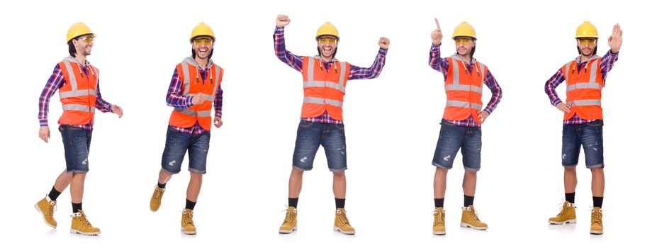 Walking young construction worker isolated on white