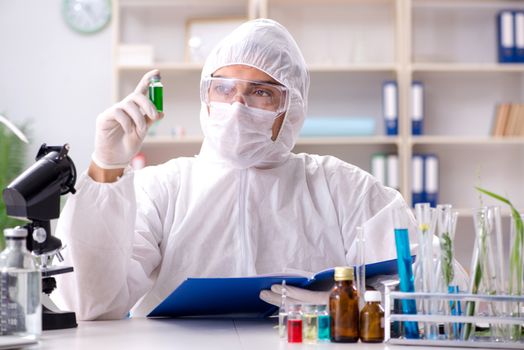Biotechnology scientist chemist working in lab