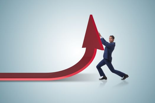 Businessman supporting growtn in economy on chart graph