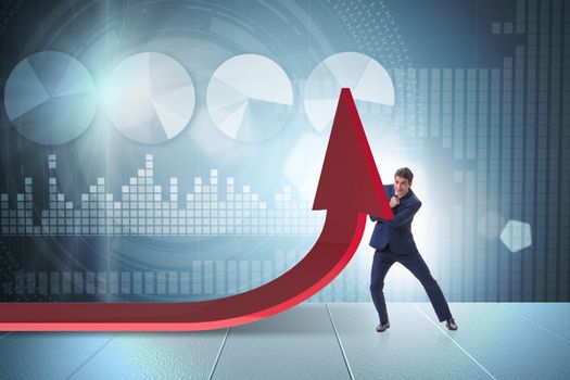 Businessman supporting growtn in economy on chart graph