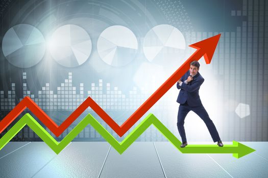 Businessman supporting growtn in economy on chart graph