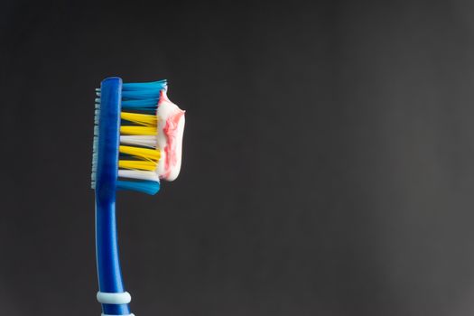 Toothbrush closeup on white background. Healthy concept