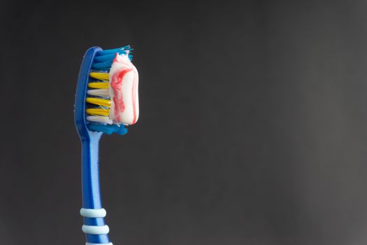 Toothbrush closeup on white background. Healthy concept