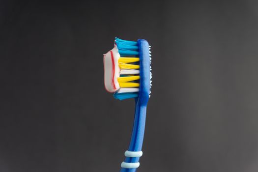 Toothbrush closeup on white background. Healthy concept