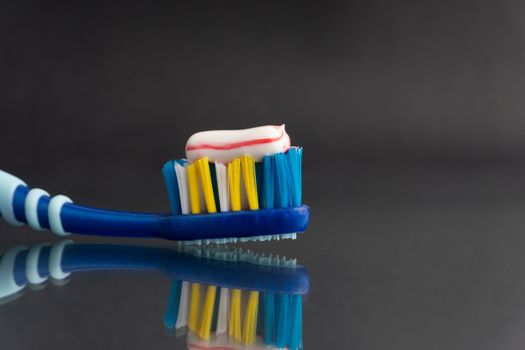 Toothbrush closeup on white background. Healthy concept