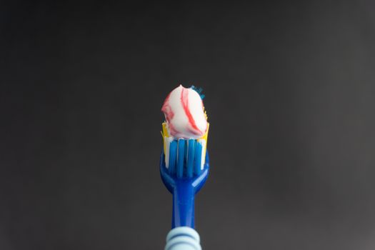 Toothbrush closeup on white background. Healthy concept