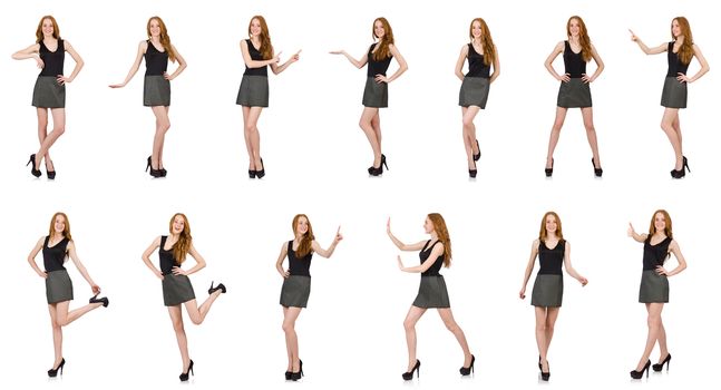 Red hair girl in gray dress isolated on white