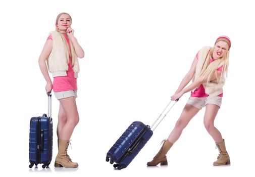 Young woman with suitcase ready for beach holiday