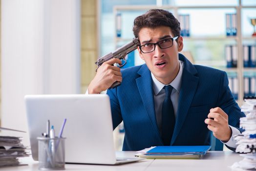 Stressed businessman thinking of suicide due to excessive workload