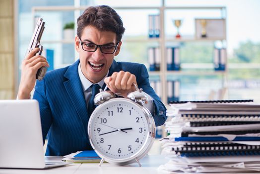 Stressed businessman thinking of suicide due to excessive workload