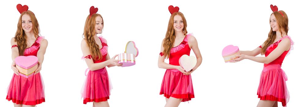 Pretty young model in mini pink dress holding gift box isolated on white