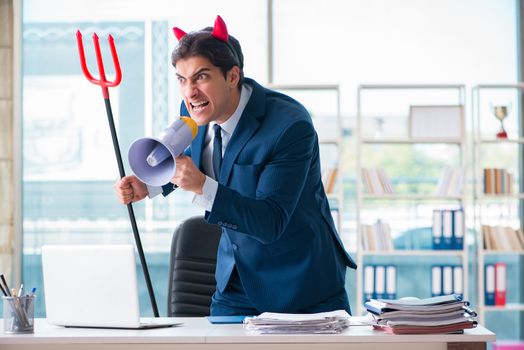 Devil angry businessman in the office