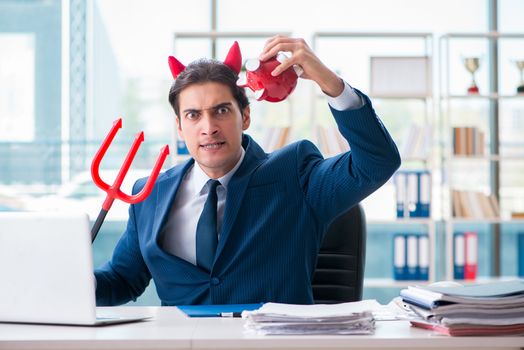 Devil angry businessman in the office