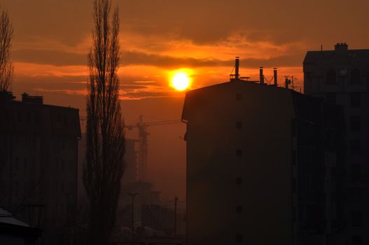 Apartment building constructions, with big crane in motion