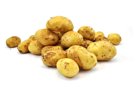 Fresh raw potato on white background