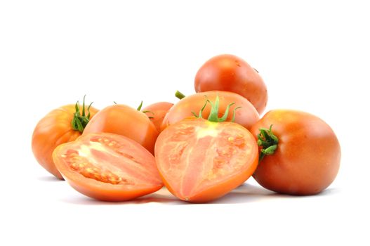 Fresh organic homegrown tomatoes on white background