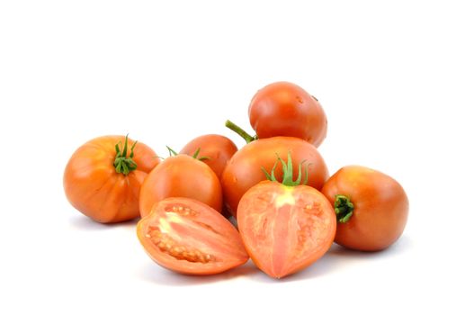 Fresh organic homegrown tomatoes on white background