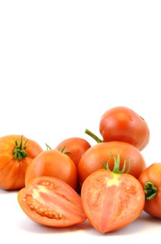 Fresh organic homegrown tomatoes on white background