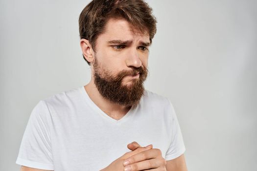 emotional bearded man close-up facial expression studio lifestyle. High quality photo