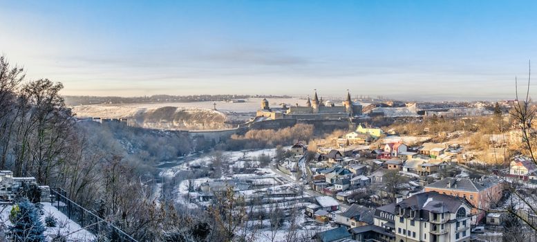 Kamianets-Podilskyi, Ukraine 01.07.2020. Panoramic view of the Kamianets-Podilskyi fortress in the early sunny winter morning