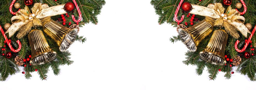 New Year and Christmas composition design isolated on white background, fir tree branches jingle bells golden and red decorative baubles and pine cones traditional design