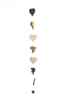 Cute wooden angel cupid and hearts decor isolated on white background, Theme of love. Valentine's day.