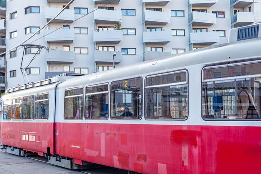 tram at the stop in the city center, public transport.