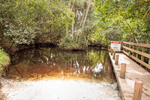 Fort Myers, Florida, USA – November 1, 2020:  Kayak launch and Boardwalk that extends through Manatee Park in Fort Myers, Florida.