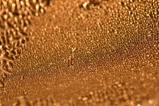 Deail of metal surface covered in water drops - abstract background