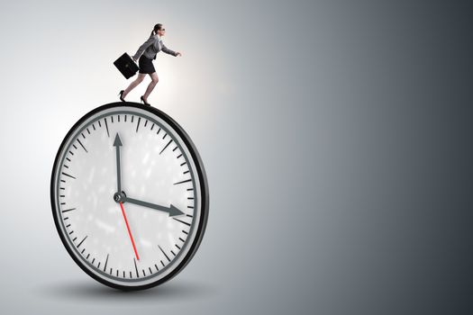 Businesswoman in time management concept