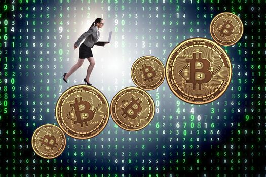 Businesswoman in bitcoin price increase concept