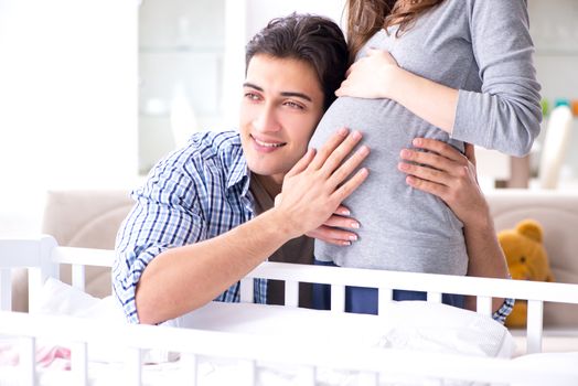 Young parents expecting their first baby