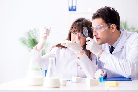 Two lab doctor testing food products