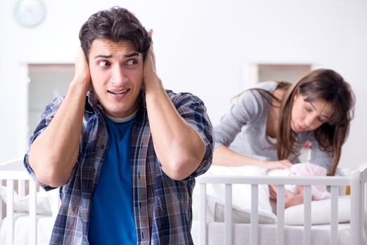 Young dad cannot stand baby crying