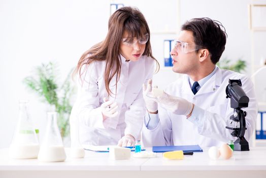 Two lab doctor testing food products