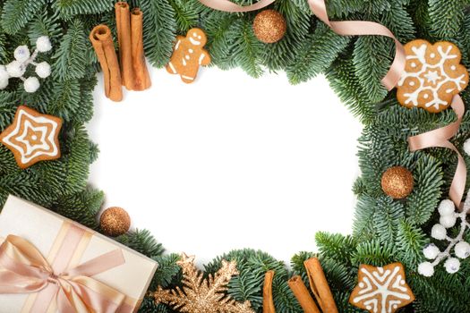 Christmas design boder frame greeting card of noble fir tree branches gift and gingerbread cookies isolated on white background