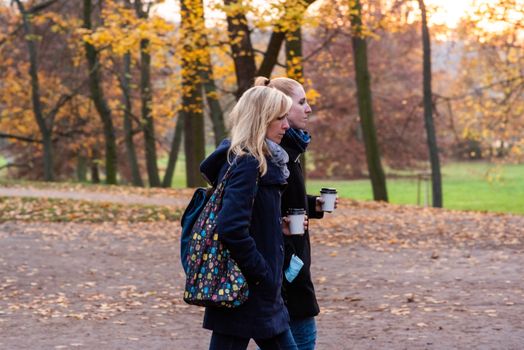 11/14/2020. Park Stromovka. Prague czech Republic. Two women is walking in the park on a Sunday winter day.